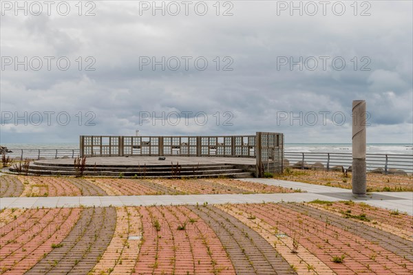 Empty viewing platform facing the sea with a wide-open space under a cloudy sky, in Ulsan, South Korea, Asia