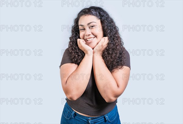 Happy girl face looking and smiling at the camera isolated. Portrait of beautiful girl smiling at the camera isolated