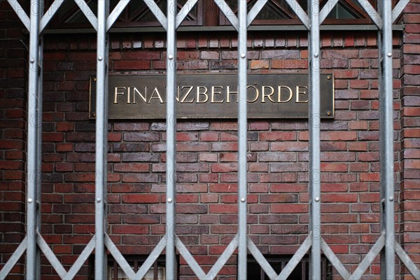 Sign with inscription 'Finanzbehoerde hinter Gittern', Hanseatic City of Hamburg, Hamburg, Germany, Europe