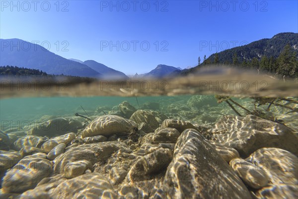 Underwater shot of river in front of mountains, summer, sun, Isar, Vorderriss, Toelzer Land, Karwendel Mountains, Bavaria, Germany, Europe