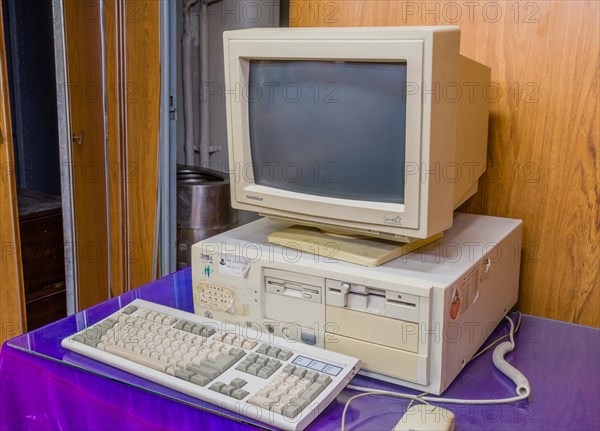 Old computer with both 3.5 and 5 inch disk drive complete with crt monitor and keyboard in Gangneung, South Korea, Asia