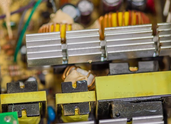 Internal heat sink and electrical components of used atx computer power supply