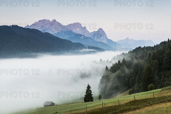 Sunrise and morning fog, Geroldsee or Wagenbruechsee, Kruen near Mittenwald, Werdenfelser Land, Upper Bavaria, Bavaria, Germany, Europe