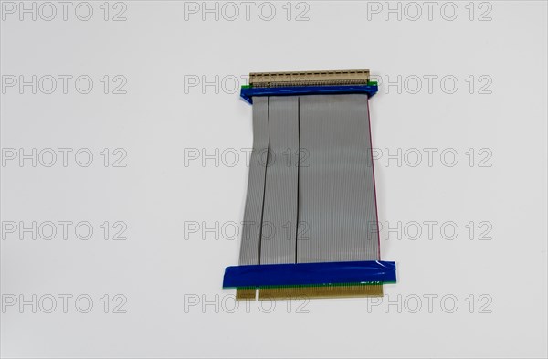 Riser for PCI slot in desktop computers used to add raise graphic cards off of motherboards