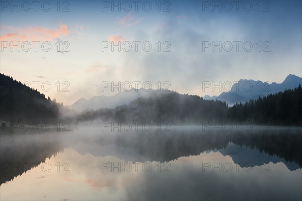 Sunrise and morning fog, Geroldsee or Wagenbruechsee, Kruen near Mittenwald, Werdenfelser Land, Upper Bavaria, Bavaria, Germany, Europe