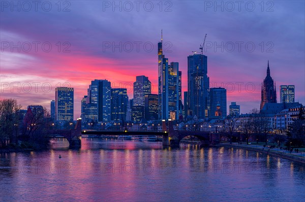 The Frankfurt skyline with office towers behind the Main at sunset, on the right the Kaiserdom, Frankfurt am Main, Hesse, Germany, Europe