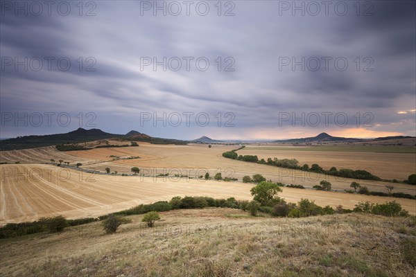 Bohemian low mountain range. Dramatic weather mood. Summer thunderstorms in the north of the Czech Republic