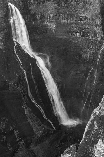 Foaming Halfoss waterfall, black and white photo, Sudurland, Iceland, Europe