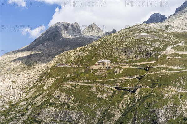 View of the serpentines of the Furka Pass road and the famous Hotel Belvedere, Obergoms, Canton Valais, Switzerland, Europe