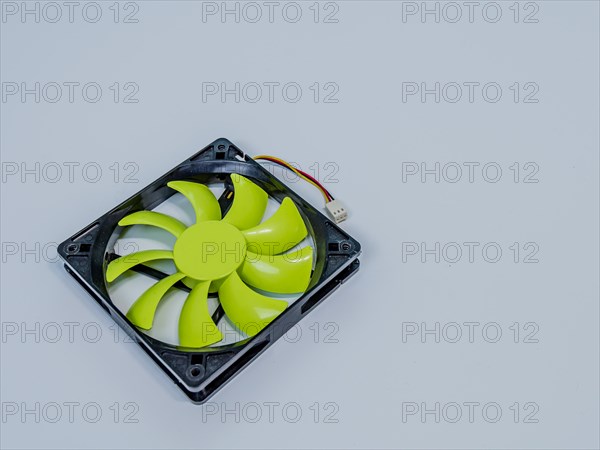 Green 120mm computer case fan with black frame and 3 prong pin power connection