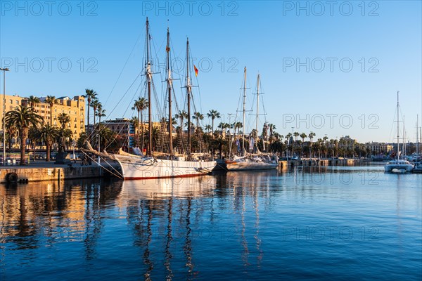 Sailing ships at anchor in the old harbour of Barcelona, Spain, Europe
