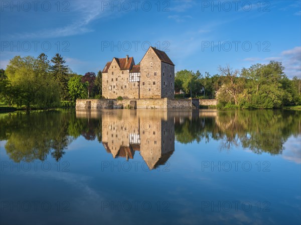 Wasserburg, moated castle Brennhausen near Sulzdorf an der Lederhecke, Hassberge, Rhoen-Grabfeld, Lower Franconia, Bavaria, Germany, Europe