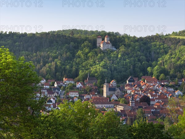 View of the town of Treffurt in the Werra Valley and Normannstein Castle in the evening light, Treffurt, Thuringia, Germany, Europe