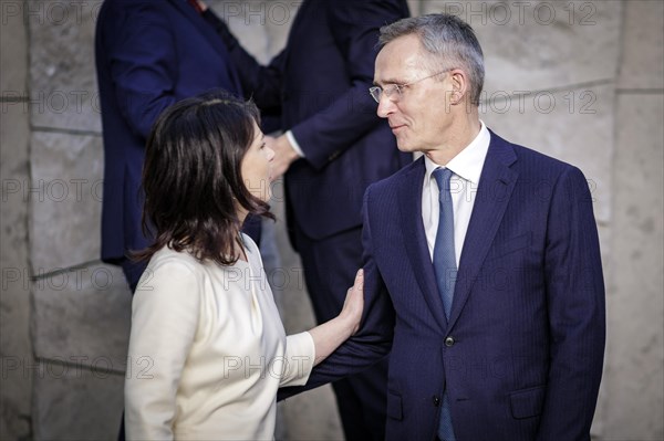 (L-R) Annalena Baerbock, Federal Foreign Minister, in conversation with Jens Stoltenberg, NATO Secretary General, at the family photo during the meeting of NATO foreign ministers. Brussels, 03.04.2024. Photographed on behalf of the Federal Foreign Office
