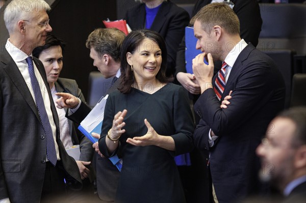 Annalena Baerbock, Federal Foreign Minister, in conversation with Gabrielius Landsbergis, Foreign Minister of Lithuania, in front of the start of a meeting of the North Atlantic-Ukraine Council in the format of the Foreign Ministers of the States Parties and Ukraine. Brussels, 04.04.2024. Photographed on behalf of the Federal Foreign Office