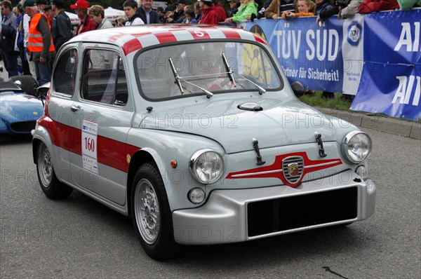 A white vintage racing car with red stripes and racing number at an event, SOLITUDE REVIVAL 2011, Stuttgart, Baden-Wuerttemberg, Germany, Europe