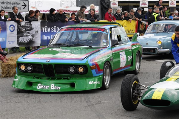 A green racing car with the number 141 drives on a road, surrounded by spectators, SOLITUDE REVIVAL 2011, Stuttgart, Baden-Wuerttemberg, Germany, Europe