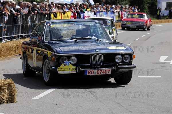 A black BMW vintage racing car in front of spectators at a classic car race, SOLITUDE REVIVAL 2011, Stuttgart, Baden-Wuerttemberg, Germany, Europe