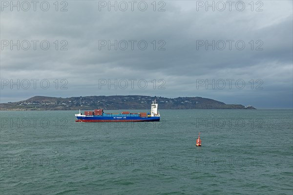 Container ship arrives at the harbour, Howth Peninsula, Dublin, Republic of Ireland