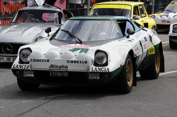 A white and green Lancia Stratos with the number 419 in rally livery at a race, SOLITUDE REVIVAL 2011, Stuttgart, Baden-Wuerttemberg, Germany, Europe