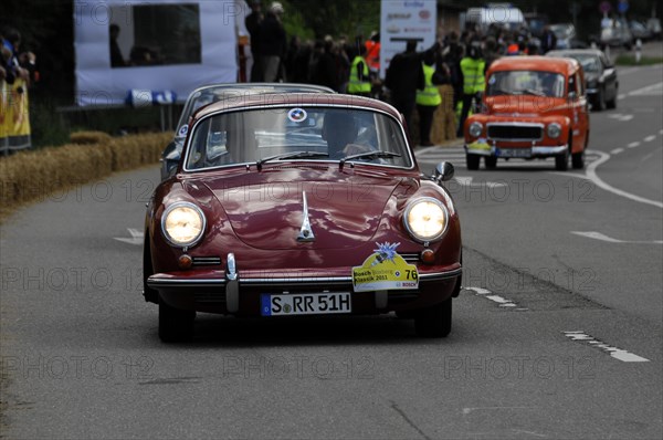 A small red car drives on a rally, SOLITUDE REVIVAL 2011, Stuttgart, Baden-Wuerttemberg, Germany, Europe