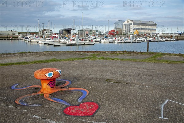 Painted bollards, octopus, boats, buildings, marina, Dunkirk, France, Europe