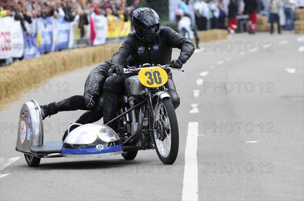A racer on a classic motorbike takes part in a race, SOLITUDE REVIVAL 2011, Stuttgart, Baden-Wuerttemberg, Germany, Europe