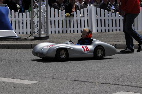 Young driver in a soapbox with number 18 passes spectators at the race track, SOLITUDE REVIVAL 2011, Stuttgart, Baden-Wuerttemberg, Germany, Europe