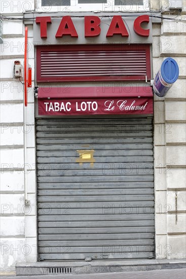 Marseille, Closed tobacco shop with red awning and golden letters, Marseille, Departement Bouches-du-Rhone, Region Provence-Alpes-Cote d'Azur, France, Europe