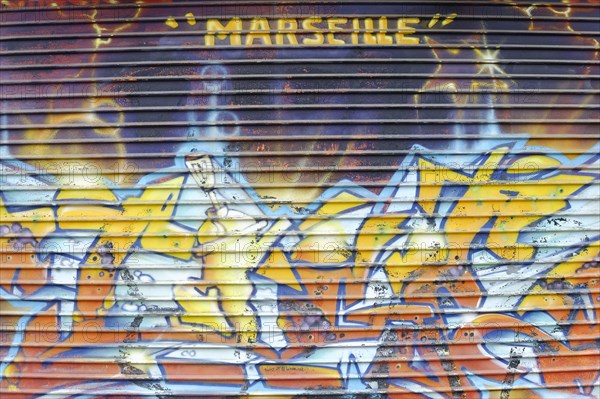 Marseille, Colourful graffiti art with the lettering 'Marseille' on a wall, Marseille, Departement Bouches-du-Rhone, Provence-Alpes-Cote d'Azur region, France, Europe