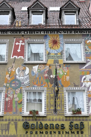 Golden Barrel, Wuerzburg, A vividly painted house facade with depictions of historical figures and scenes, Wuerzburg, Lower Franconia, Bavaria, Germany, Europe