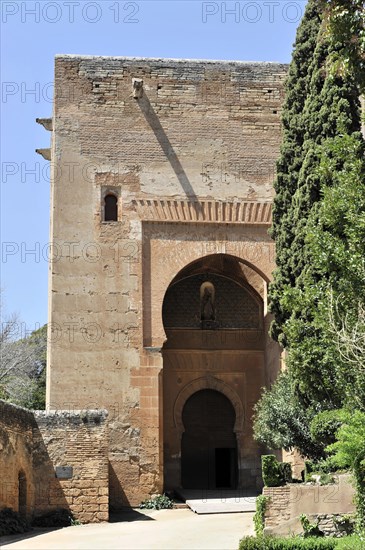 Alhambra, Granada, Andalusia, Old gate with a tree on the side and a clear shadow play, Granada, Andalusia, Spain, Europe