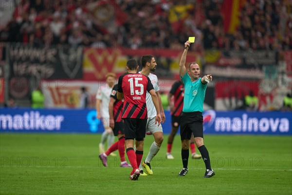 Bundesliga Eintracht Frankfurt-Union Berlin at Deutsche Bank Park in Frankfurt. Referee Marco Fritz shows the yellow card. Frankfurt, Hesse, Germany, Europe