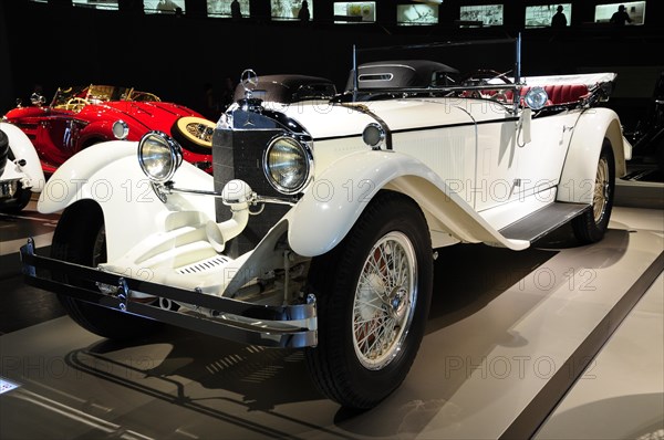 Highly polished white classic car in a motor show, Mercedes-Benz Museum, Stuttgart, Baden-Wuerttemberg, Germany, Europe