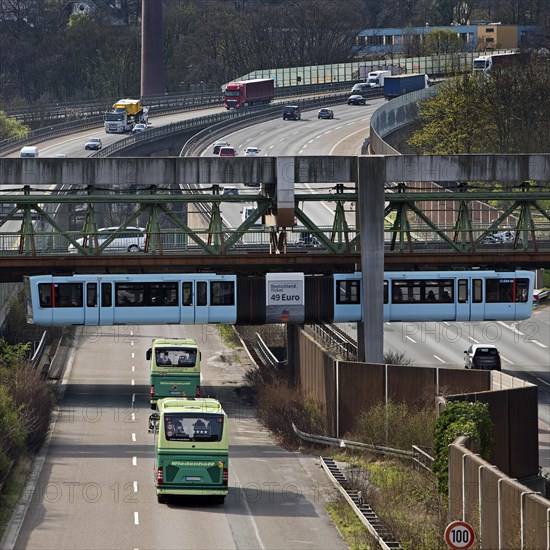 Wuppertal suspension railway crosses the A46 motorway at Sonnborner Kreuz, motorway junction, Wuppertal, North Rhine-Westphalia, Germany, Europe