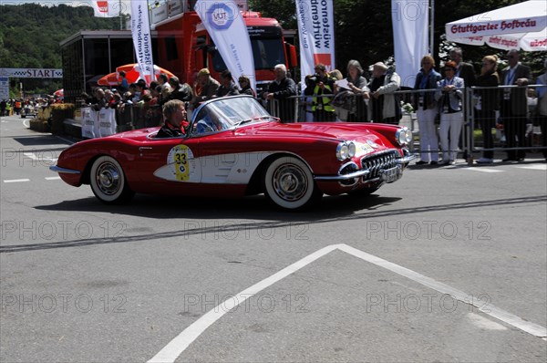 A red Chevrolet convertible classic at a classic car race watched by spectators, SOLITUDE REVIVAL 2011, Stuttgart, Baden-Wuerttemberg, Germany, Europe