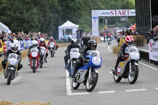 The exciting atmosphere at the start of a motorbike race with many riders, SOLITUDE REVIVAL 2011, Stuttgart, Baden-Wuerttemberg, Germany, Europe
