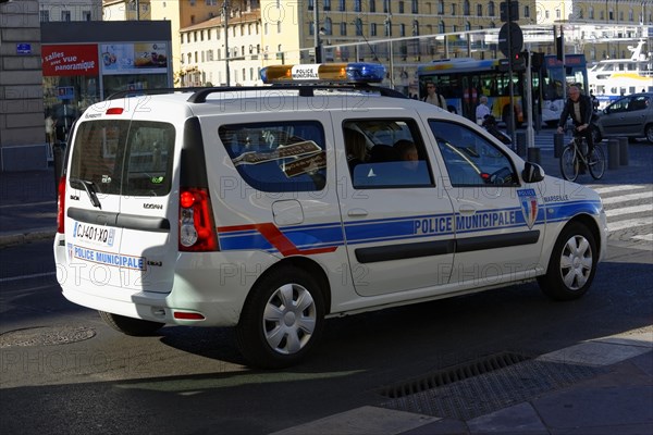 Police car parked on a city street in daylight, Marseille, Bouches-du-Rhone department, Provence-Alpes-Cote d'Azur region, France, Europe