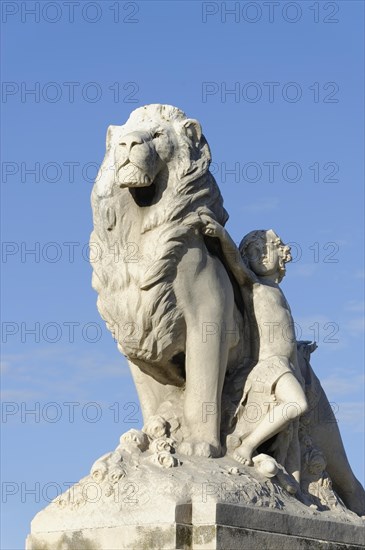 Marseille, White marble sculpture of a lion and a woman in front of a blue sky, Marseille, Departement Bouches-du-Rhone, Provence-Alpes-Cote d'Azur region, France, Europe