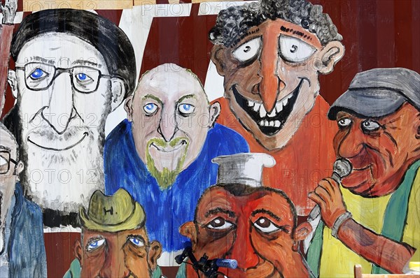 Marseille art bazaar, wall painting with colourful caricatures of various facial expressions, Marseille, Departement Bouches-du-Rhone, Provence-Alpes-Cote d'Azur region, France, Europe
