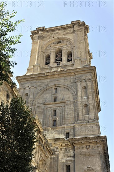 Granada, Church tower with historical architecture against the sky, Granada, Andalusia, Spain, Europe