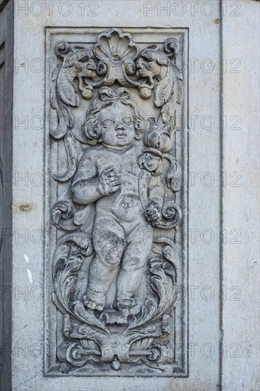 Relief of a child, architectural details at the Residenzschloss in the Inner Old Town of Dresden, Saxony, Germany, Europe