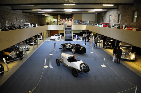 Deutsches Automuseum Langenburg, View of the exhibition of an automobile museum with historic vehicles and visitors, Deutsches Automuseum Langenburg, Langenburg, Baden-Wuerttemberg, Germany, Europe