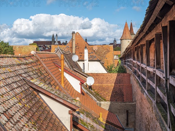 View from the battlements of the town wall to the houses and towers of the historic old town, Rothenburg ob der Tauber, Middle Franconia, Bavaria, Germany, Europe