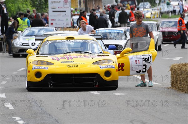 A vivid yellow modern racing car on the track, ready for the start, SOLITUDE REVIVAL 2011, Stuttgart, Baden-Wuerttemberg, Germany, Europe