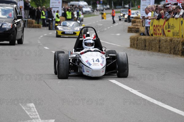 A formula racing car drives on a closed-off track during a street race, SOLITUDE REVIVAL 2011, Stuttgart, Baden-Wuerttemberg, Germany, Europe