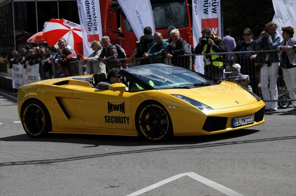 A Lamborghini convertible drives in front of spectators at a motorsport event, SOLITUDE REVIVAL 2011, Stuttgart, Baden-Wuerttemberg, Germany, Europe
