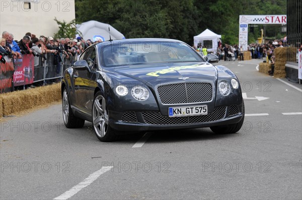 Black Bentley sports car drives along in front of spectators at a racing event, SOLITUDE REVIVAL 2011, Stuttgart, Baden-Wuerttemberg, Germany, Europe