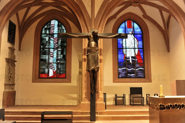 St Kilian's Cathedral, St Kilian's Cathedral, Wuerzburg, Sculpture of the Crucifixion of Christ in front of a stained glass window, Wuerzburg, Lower Franconia, Bavaria, Germany, Europe