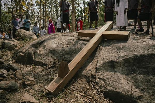 Christian devotees takes part in a perform to re-enactment of the crucifixion of Jesus Christ during a procession on Good Friday, on March 29, 2024 in Guwahati, Assam, India. Good Friday is a Christian holiday commemorating the crucifixion of Jesus Christ and his death at Calvary